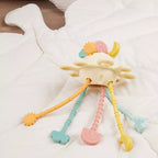 Montessori veiklos žaislas - silikoninė planeta, geltonos spalvos su tampomis spalvotomis dalimis